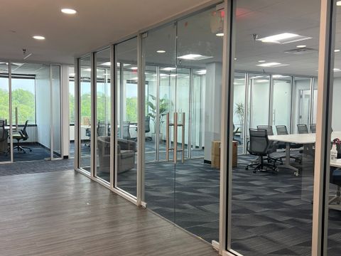 Glass-walled meeting room installed by Stonewing